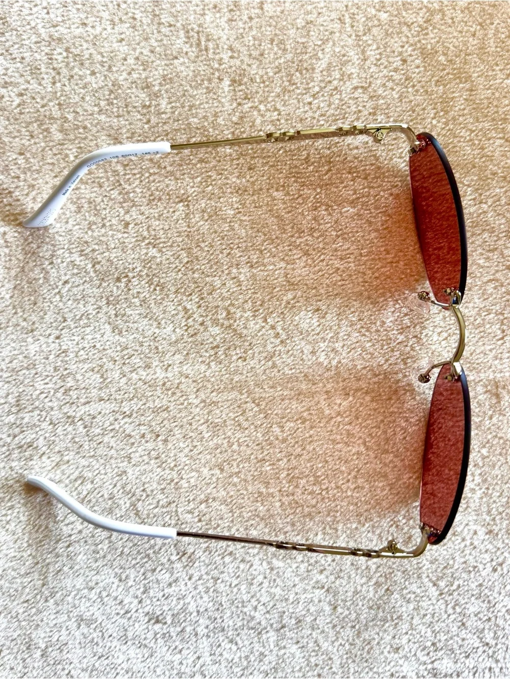Y2K-Style Guess Rimless Pink Oval Sunglasses